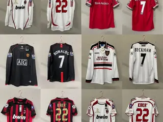 A wall of football shirts in red, white and black